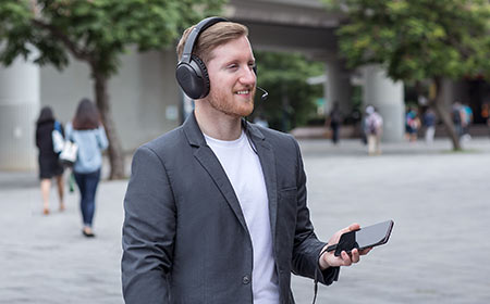 You can use the ASUS AI Noise-Canceling Mic Adapter while out on a walk
